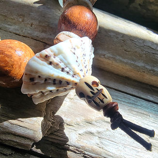 Photo of the Limpet Shell and Bone Mlala Skull of the Islands To Highlands Roatan Bracelet.