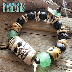Photograph of the Islands To Highlands Hilo Side Bracelet on driftwood.