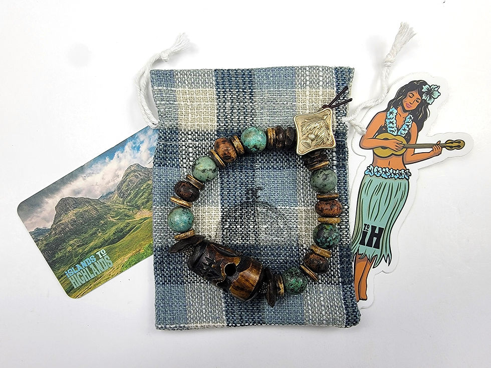 Thumbnail: Photograph of the Scotland The Brave Bracelet, bracelet bag and iH Hula Gal Decal.