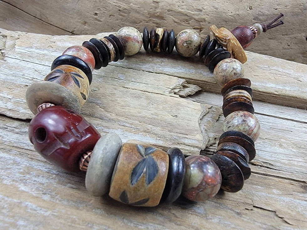 Thumbnail: Photo of the Carthage Tunisia Bracelet on a piece of driftwood.