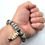 Thumbnail: Bottom view photograph of a man's wrist wearing the Islands To Highlands Pensacola Cadillac Bracelet.