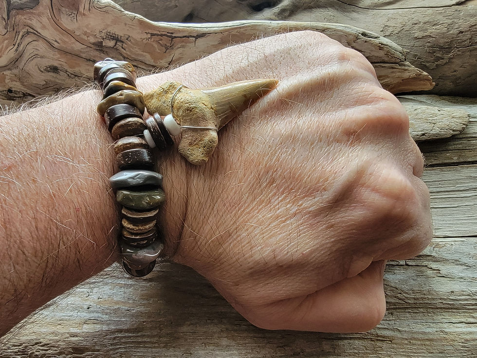 Thumbnail: Photo of a man's wrist wearing the Islands To Highlands Just Off The Canary Island Cliffs Bracelet.