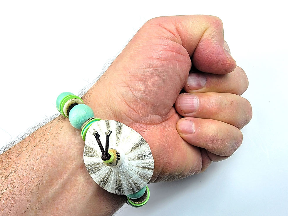 Thumbnail: Bottom view photo of a man's wrist wearing the Islands To Highlands Key West Bracelet.