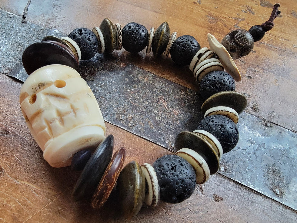 Thumbnail: Photograph of the Islands To Highlands Mauna Kea Bracelet on an antique desk.