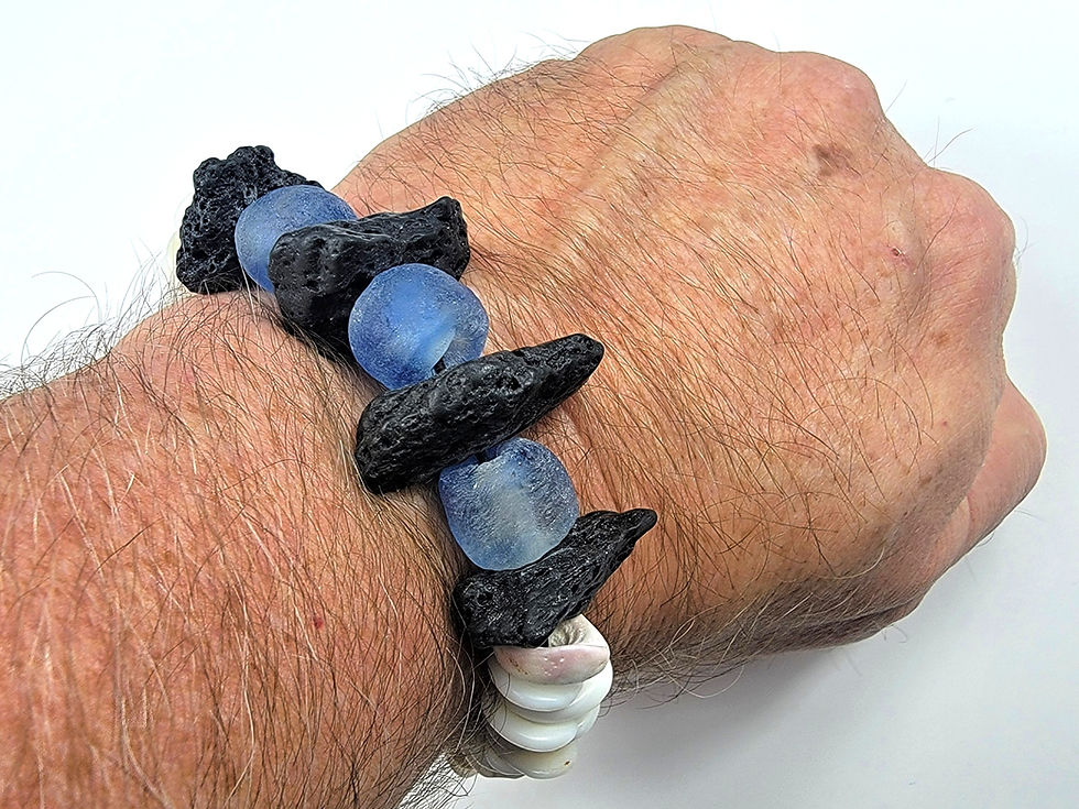 Thumbnail: Photo of a man's wrist wearing the Islands To Highlands Big Island Bracelet.