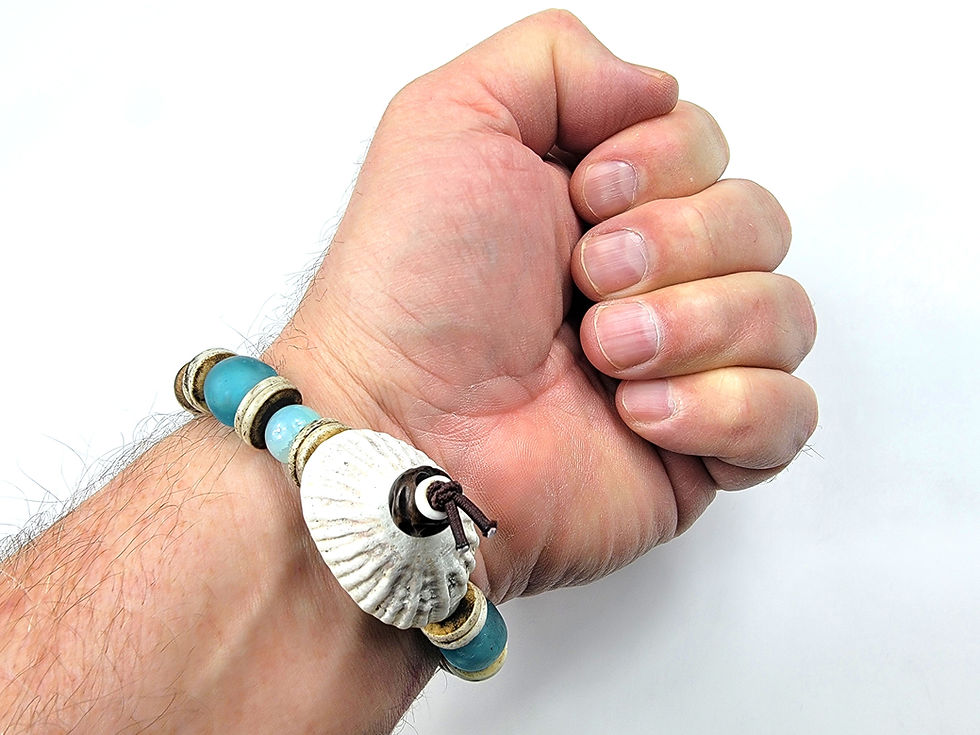 Thumbnail: Bottom view photograph of a man's wrist wearing the Islands to Highlands Mighty Maldives Bracelet.