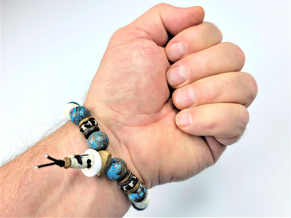 Thumbnail: Bottom view photo of a man's wrist wearing the Islands To Highlands Bunker Bay Bracelet.
