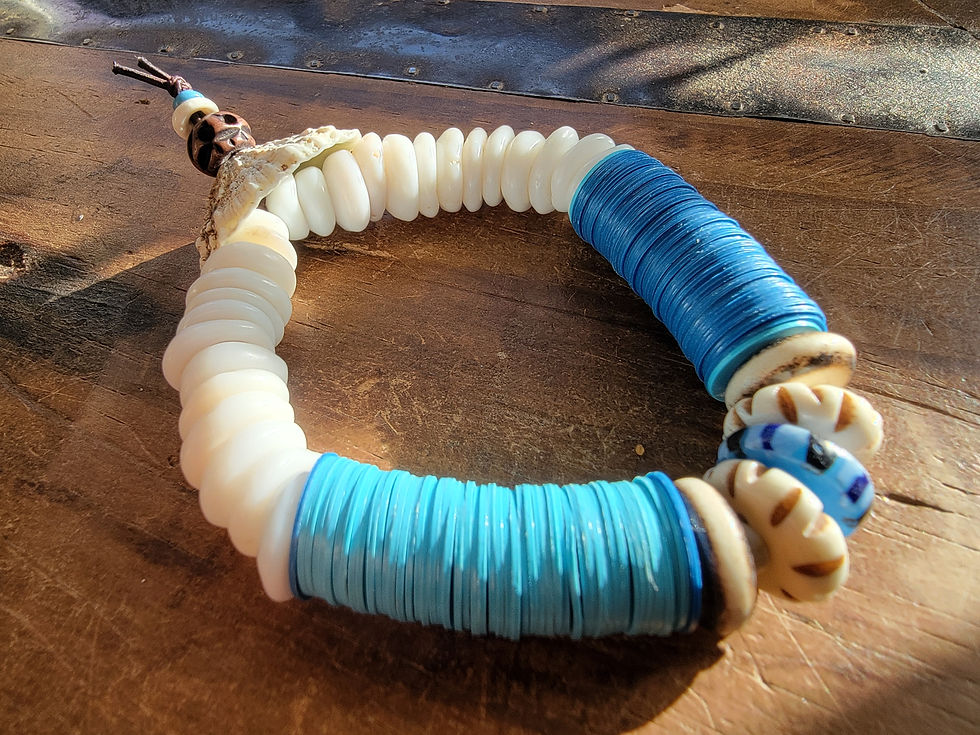 Thumbnail: Photograph of the Islands To Highlands Aruba Bracelet on wood.