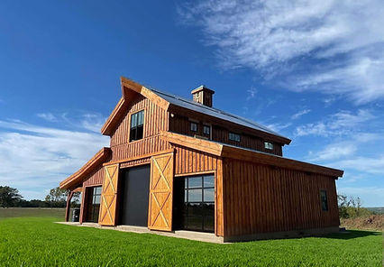 Custom barndominium exterior with modern architectural design