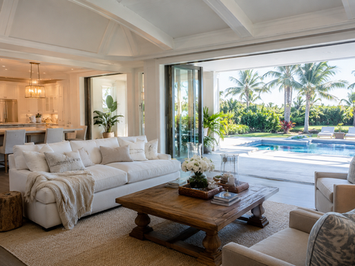 Refreshed South Florida luxury home interior with pool view, showcasing estate management and concierge home watch services in Boca Raton.