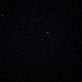 black starry night with tiny flashes of gold and blue .jpg