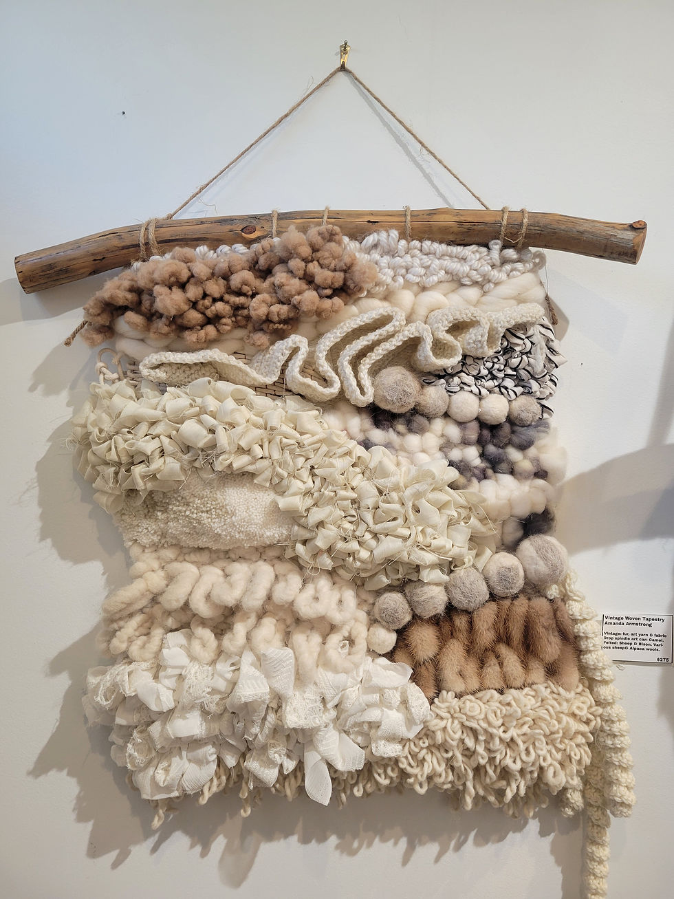 Wall weaving, wall art, Alpaca, Camel wool, bison wool. Vintage and hand spun wool fiber art on a wall.