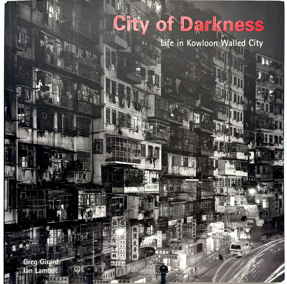 Book cover of Kowloon Walled City at night, packed apartment blocks and signs; title City of Darkness in red and white text