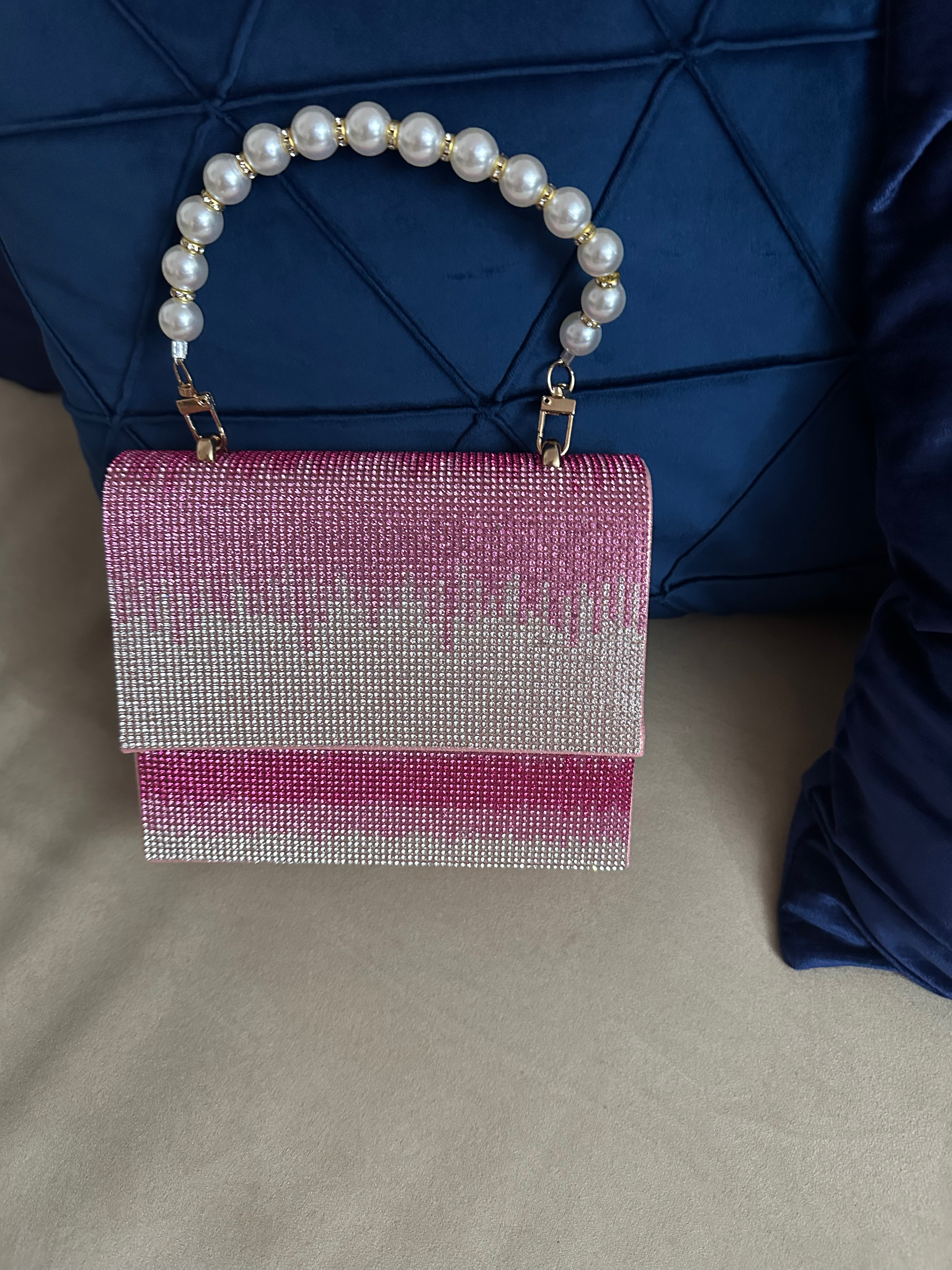 Pink sparkling purse