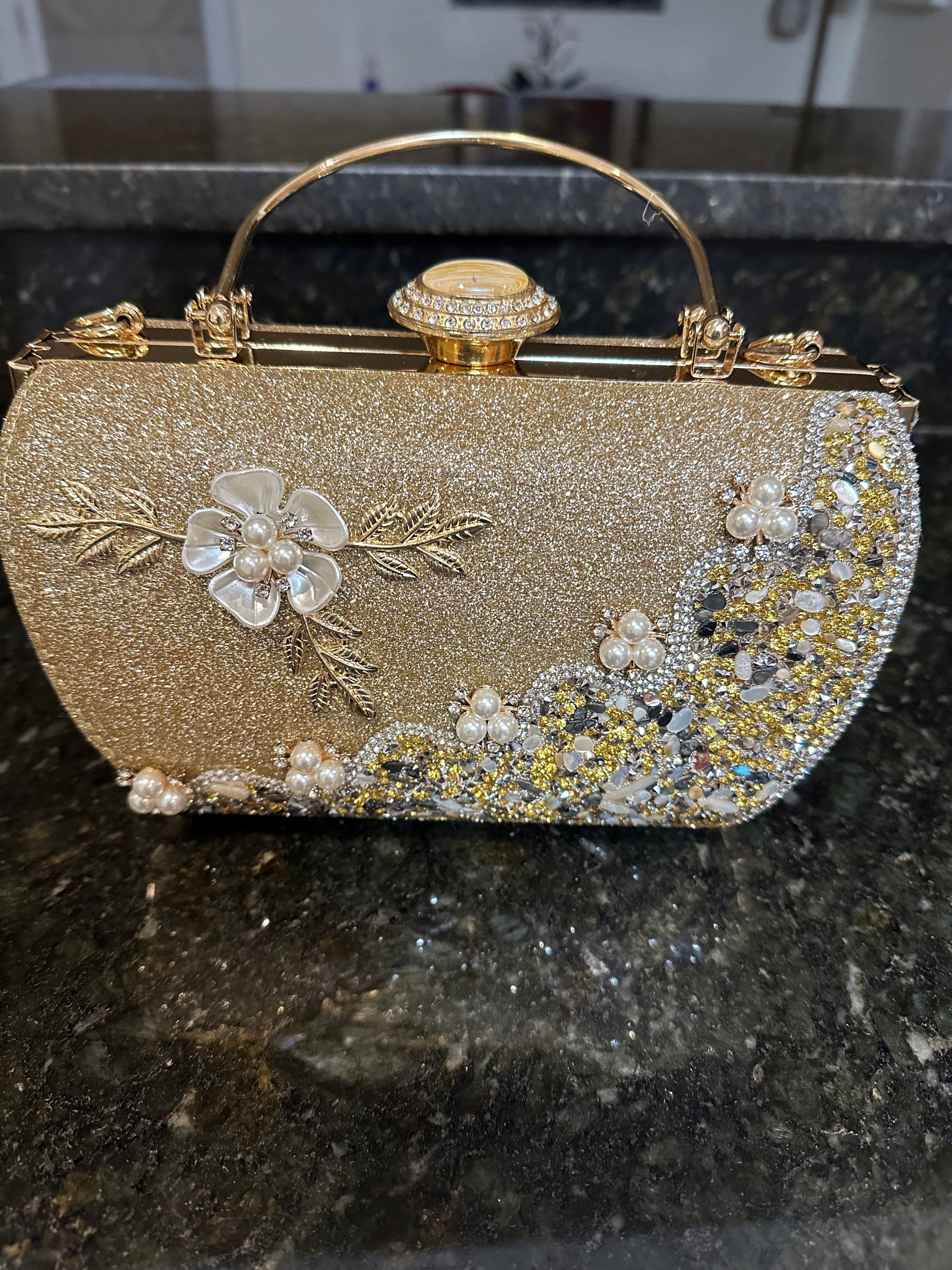 Pearl and gold hand bag