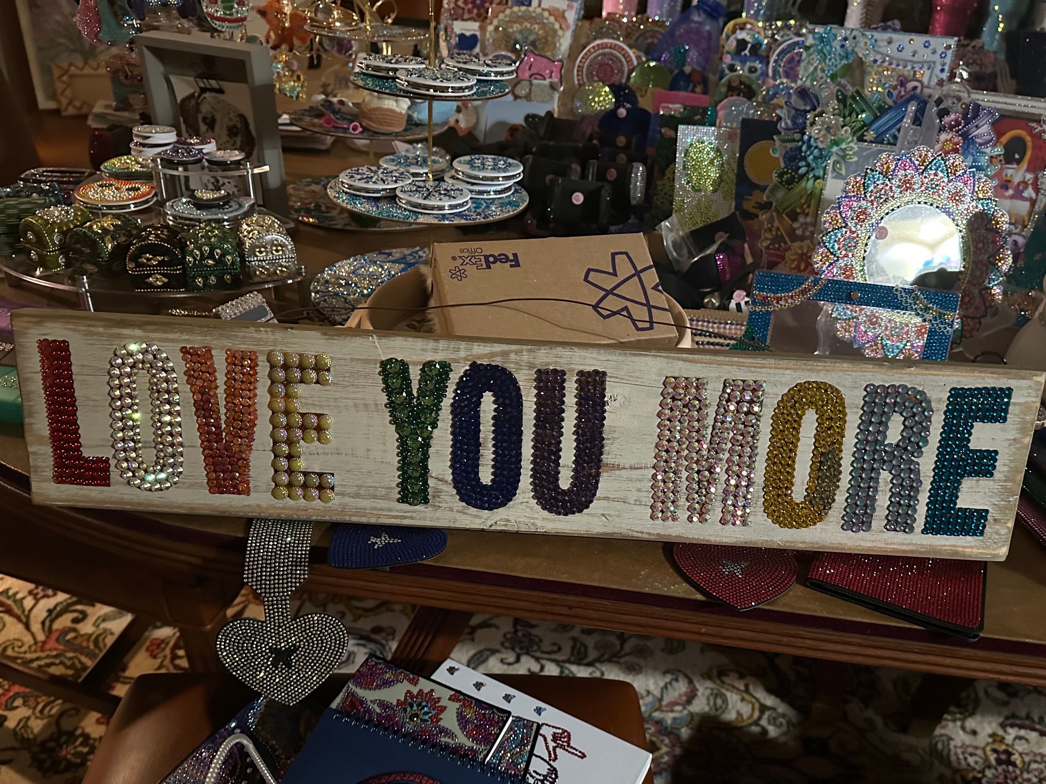 “I love you more” bling sign