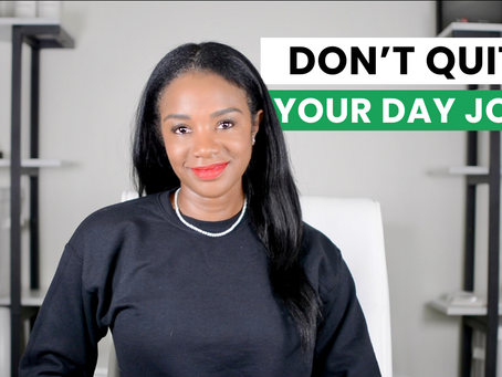 Woman in black shirt smiles in a modern office. Text reads "DON'T QUIT YOUR DAY JOB" in black and green. Shelves and boxes in background.