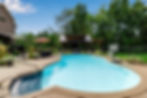 the lakeside luxe pavilion and pergola near pool