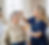Eden Care Services caregiver assisting a senior client with personal grooming and hair care.
