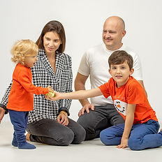 family posing for photography shoot