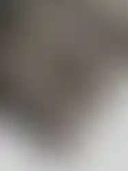 Close-up details of QILO x SC Irregulars LHOTSE down puffer in Maritime Grey, showing details around the zippered pocket