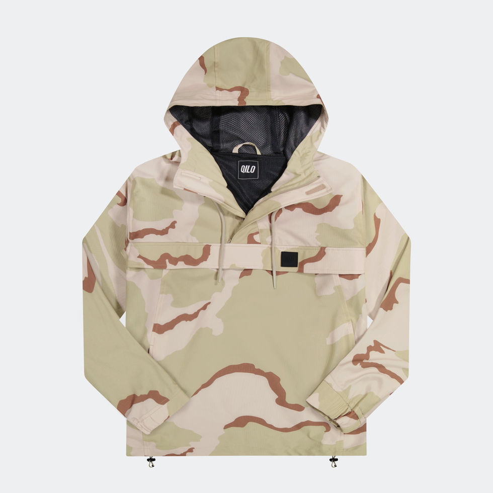 DCU camo QILO Nordwind WR Anorak with a partially opened front zipper, laid on a light grey background