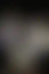 Back view of DEVTSIX operator shooting a pistol at a gun range and wearing a  DEVTSIX x Volk Tactical Gear "SUSHI NEKO" shirt