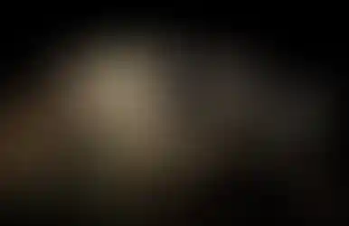 Detailed close-up of One Hundred Concepts AdminCap where a pin hole in the cap is seen