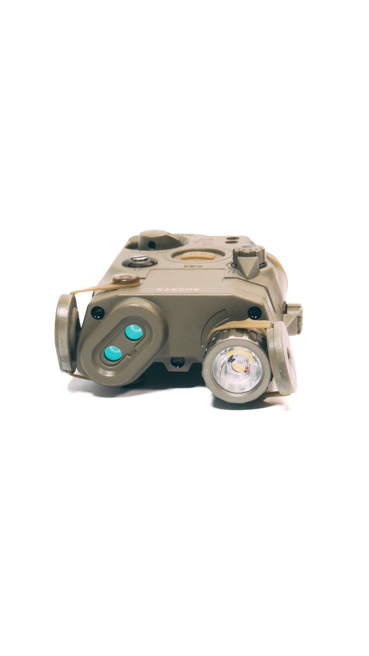 Front view of a SomoGear PEQ15 LA5C UHP with filter caps flipped, showcasing the flashlight