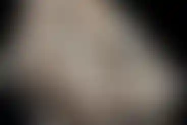 Detailed view of 3D laser cut pattern of a wearing a tactical helmet with One Hundred Concepts HelmetScrim™ 2.0