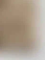 Close-up details of QILO x SC Irregulars LHOTSE down puffer in AOR1, showing details around the zippered pocket