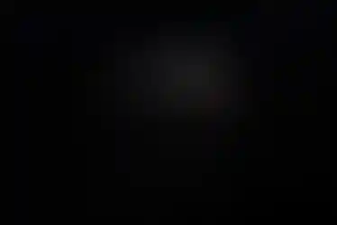 Side view of One Hundred Concepts Aimpoint Micro Series HexCap™ in black color, attached to an Aimpoint T2 red dot