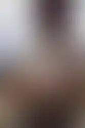 DEVTSIX operator loading bullets in a pistol magazine at a range, wearing a DEVTSIX x Volk Tactical Gear "SUSHI NEKO" shirt