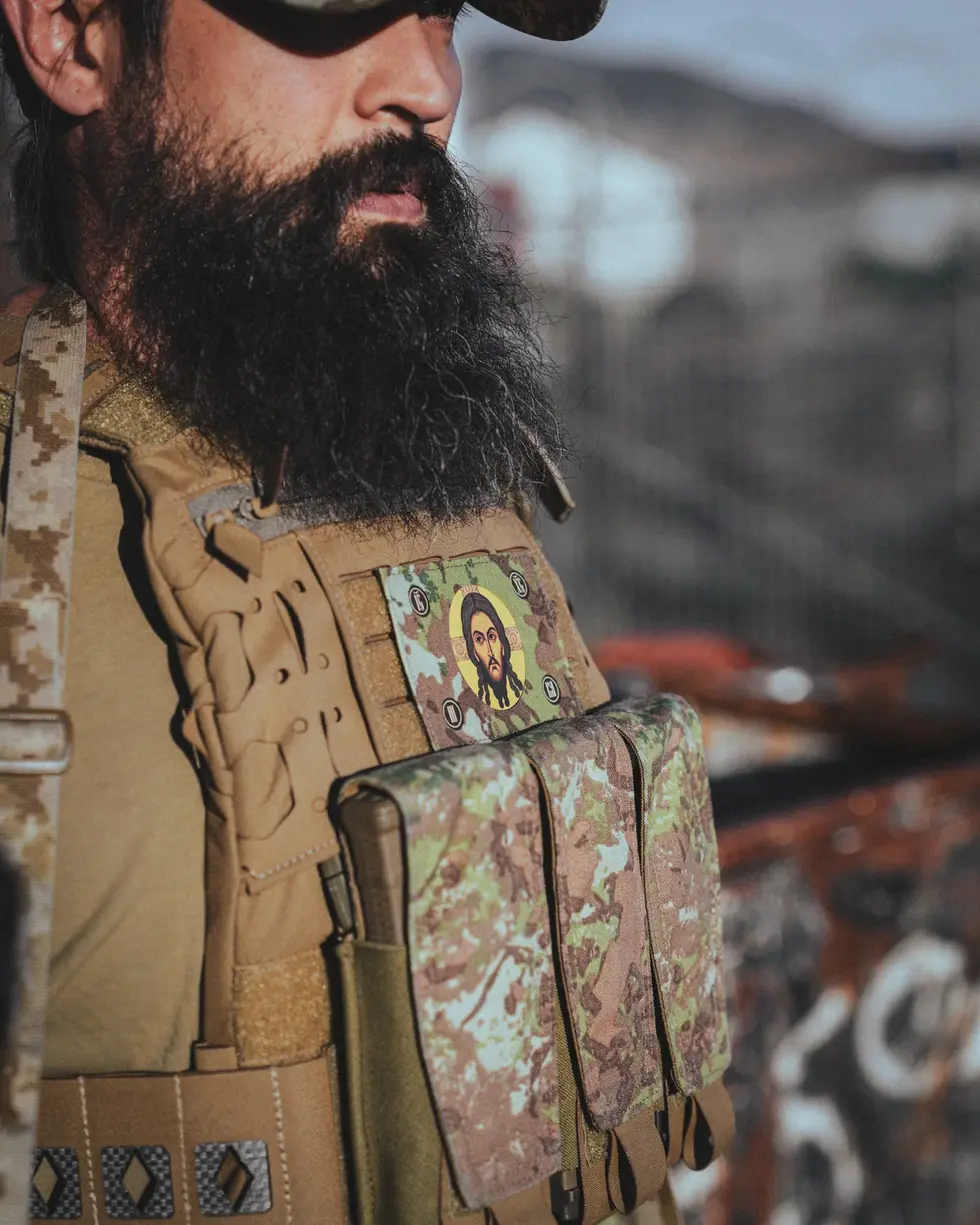 SC Irregulars HOLY FACE Flag Patch in Irregular Disruptive Hinterland on a Coyote Brown plate carrier