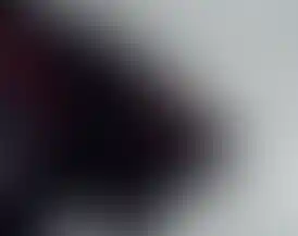 A detailed view of the "RESIST UNTO DEATH" wording on the sleeve of the SC Irregulars JESUS PRAYER S/S shirt. Text is red.