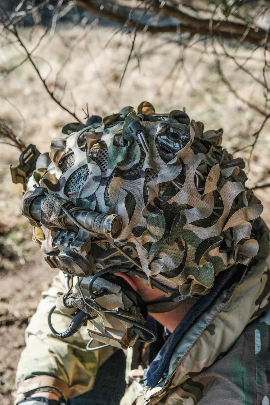 Top view of a person wearing a tactical helmet with One Hundred Concepts HelmetScrim™ 2.0