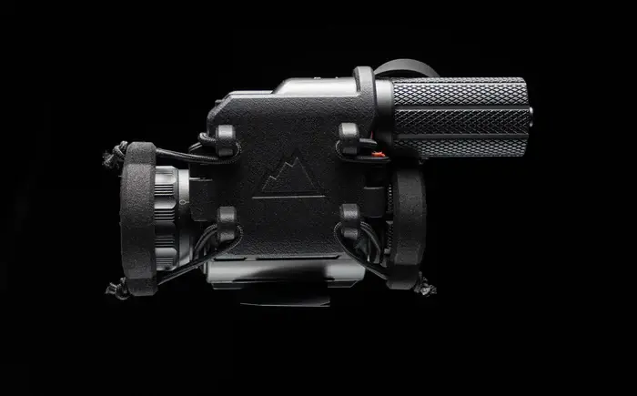 Studio photo of One Hundred Concepts ThermalCap on a StingIR thermal device. Left side view.