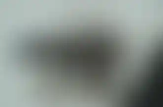 Folded stock on a Sig Sauer MCX with a black Irregular Defense FEER MCX MF (Minimalist Folding) to it