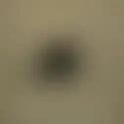 Front view of One Hundred Concepts Aimpoint Micro Series HexCap™ in black color and showing the hex pattern