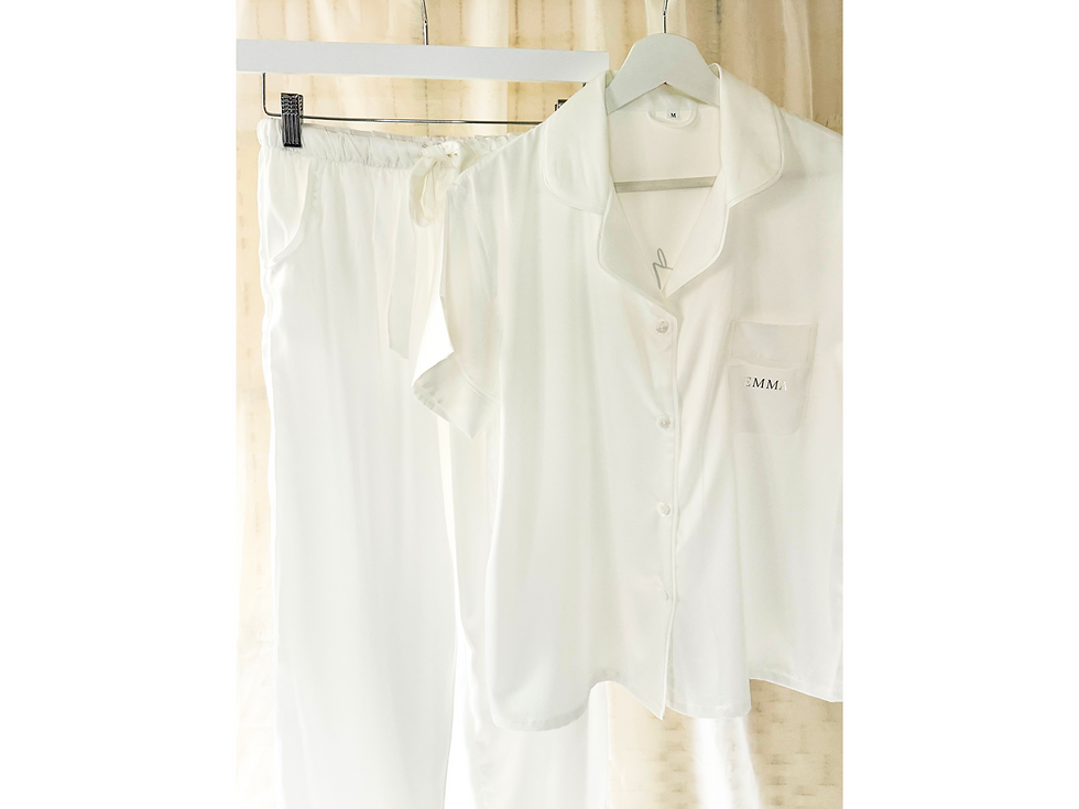Personalised bridesmaid pyjama set in satin fabric with customisable font options and available in classic white, blush pink,