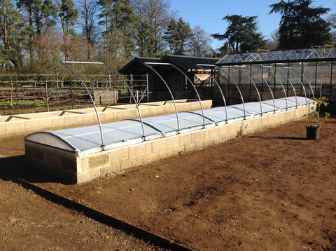 Multiple Coldframes on raised bed at National Trust Hidcote