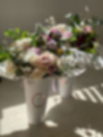 Two large bouquets going out for delivery
