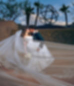 The groom whisking his bride away