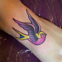 tasha_plant_swallow_foot_tattoo.jpg