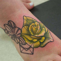 tasha_plant_rose_foot_tattoo.jpg