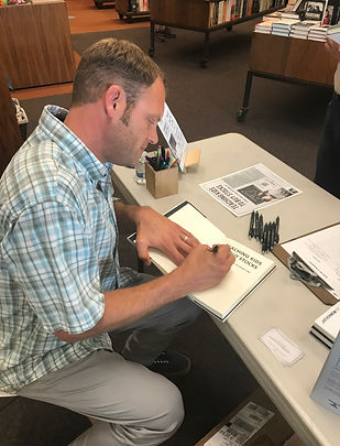 Warwicks Book Signing Action Photo