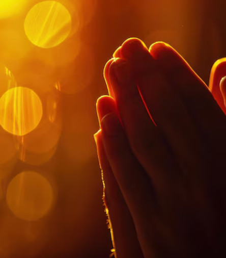 hands-prayer-with-golden-light-bokeh-symbolizing-faith-devotion-spiritual-reflection_87575