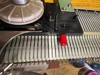 Busch Vintage Knitting Machine showing the lever for holding position knitting eg tuck stitch