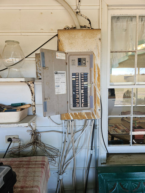 Standard house fuse box before replacement