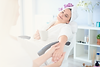 Woman getting a manicure in a salon